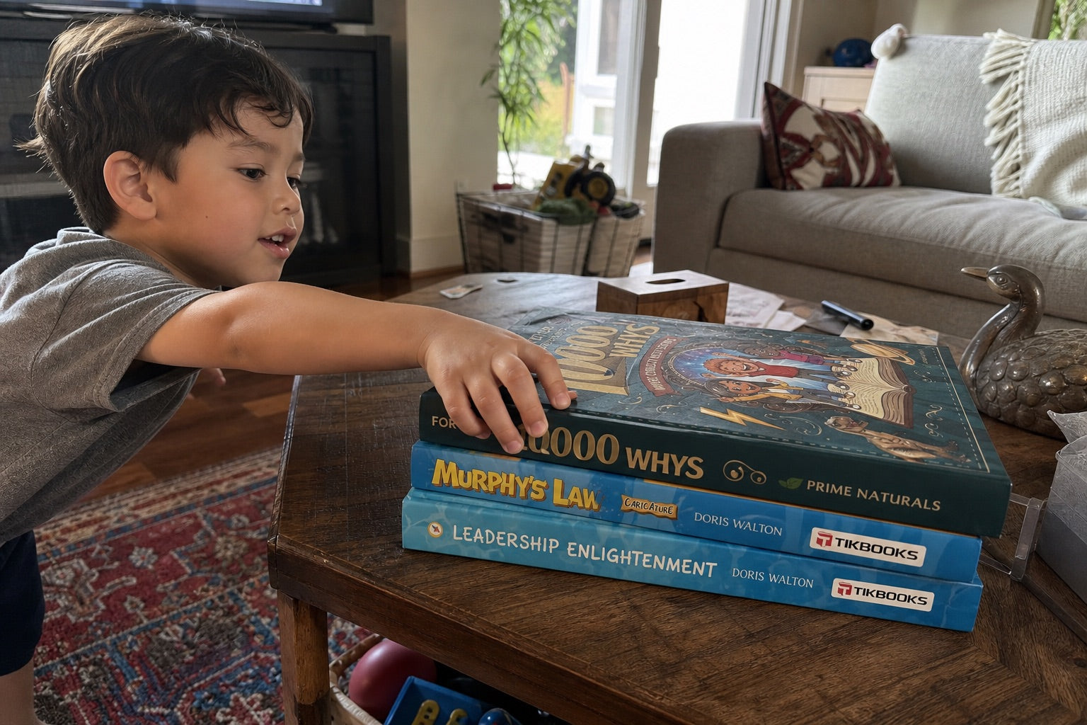 The three WonderWhy hardcovers on a table